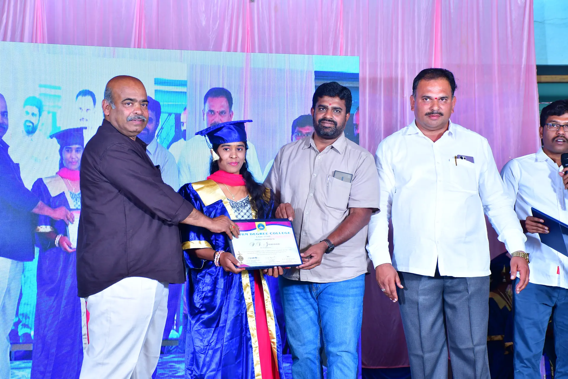 Presenting Degrees to CVRM Graduates